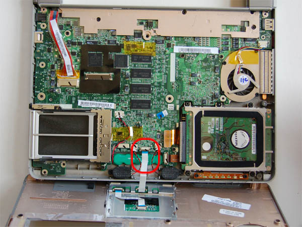 the-touchpad-ribbon-cable-must-be-detached